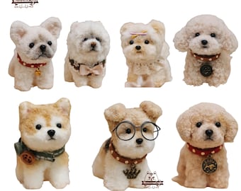 May include: A collection of eight felted dog figurines. The dogs are all different breeds and have unique features, such as glasses, bows, and collars. The figurines are all made of wool and have a soft, cuddly texture.