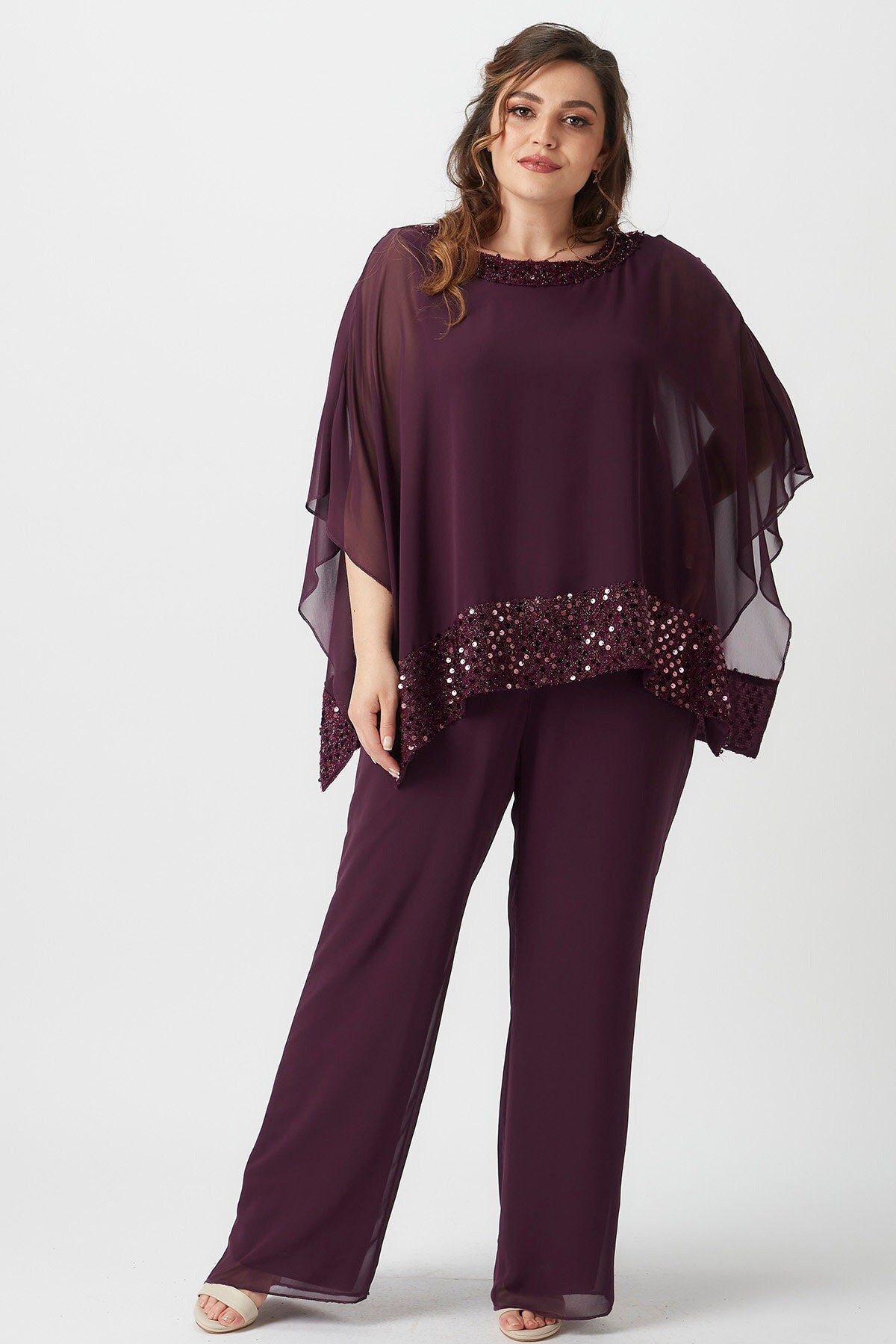 Plus size mother of the bride and groom floaty trouser suits