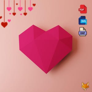 Puede incluir: Un corazón de papel rosa con un diseño geométrico. El corazón está sobre un fondo rosa claro. La imagen también incluye las palabras "PDF", "SVG" y "DXF" en cuadros separados.