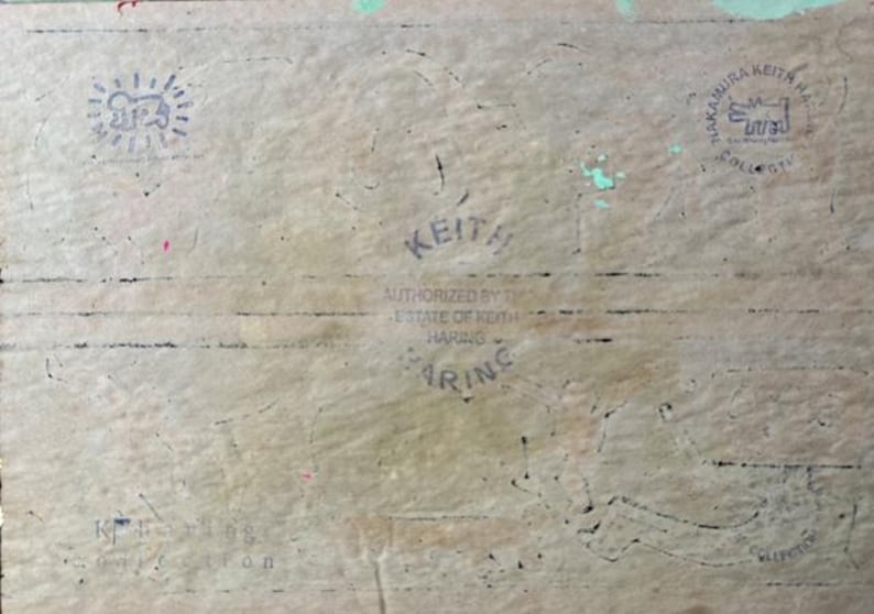 May include: Aged paper with multiple Keith Haring stamps and text. The stamps include a sunburst design with a figure, the name "Keith" and "Authorized by the Estate of Keith Haring".