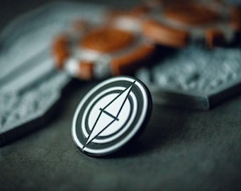 Sylop Pin – Minimalist 1-Inch Black Plated Enamel Pin