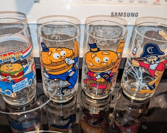 Set of three 1977 McDonald's glasses + one 1986 McVote '86 glass excellent vintage condition