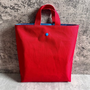 Sac humide imperméable réversible lavable vêtements de rechange garderie durabilité jouets de sable enfants Rot/Aqua