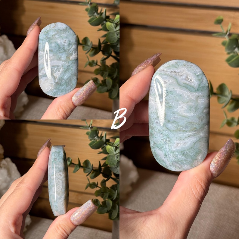 May include: Four images of a polished, oval-shaped stone with a marbled pattern of light green and white. The stone is held in a hand, with the letter "B" in white text overlaid on one image. The stone's surface is smooth and reflective.