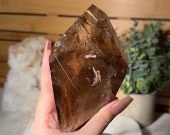 Smoky Quartz Freeform with Lodolite Partially Polished Crystal on Black Display Stand for Grounding Protection and Earthy Spiritual Decor