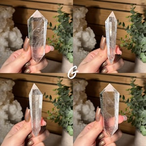 May include: Four images of clear quartz crystal points. Each crystal is held in a hand with a neutral background. The crystals are transparent with visible internal structures. The crystals are faceted and taper to a point. The letter "G" is in the center of the image.
