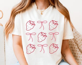 Comfort Colors® Coquette Strawberry Shirt, Pink Ribbon Shirt, Coquette Bow Shirt, Spring Shirts, Strawberries Shirt, Fruit Shirt, Trendy Tee