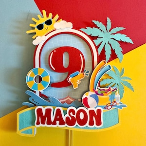 May include: A colorful birthday cake topper with a summer theme. It features a red number 9, a yellow sun wearing sunglasses, a water gun, a beach ball, and the name "MASON" in red and white lettering. Palm trees and a pool float are also included.