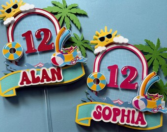 May include: Two birthday cake toppers with a pool theme. Each has a red number 12, a yellow sun with sunglasses, and a banner with a name. One banner says "ALAN" and the other says "SOPHIA". The toppers have a blue and white color scheme.
