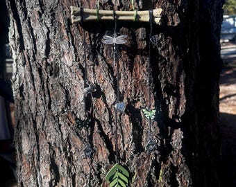 Oddity - hanging decor with bones and charms