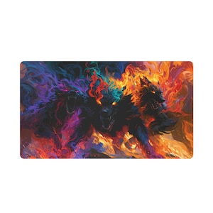 May include: A rectangular desk mat featuring a vibrant illustration of a three-headed wolf creature. The left head is surrounded by purple and blue flames, while the center and right heads are engulfed in bright orange, yellow, and red fire.