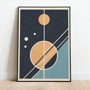 May include: A framed abstract art print with a geometric design featuring a large orange circle, a smaller yellow circle, and a blue and black background.