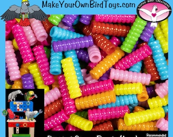 May include: A close-up image of a pile of colorful, rippled straw beads. The beads are approximately 1 inch long and are perfect for making bird toys. The beads are recommended for small to medium sized birds. The text "Rippled Straw Beads (1 oz)" is visible at the bottom of the image.