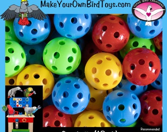 May include: A collection of colorful gumballs in blue, green, red, and yellow. The image includes text that reads "Have FUN! Be CREATIVE! Save MONEY!" and "MakeYourOwnBirdToys.com". The gumballs are recommended for small to large birds.