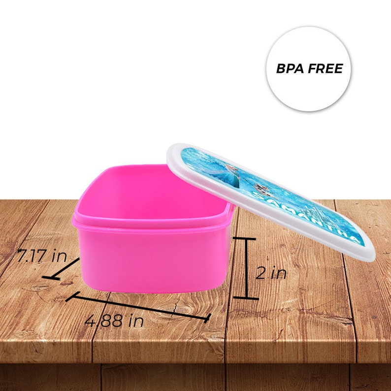 May include: Pink plastic lunch box with a white lid featuring a Frozen character design. The lunch box is 7.17 inches long, 4.88 inches wide, and 2 inches tall. BPA free.