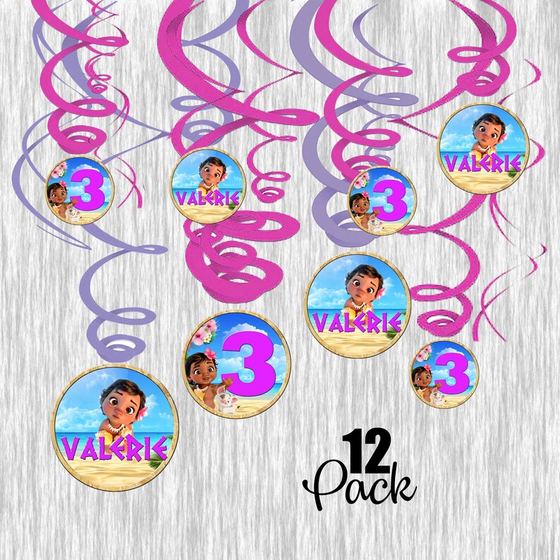 May include: A set of 12 pink and purple swirl party decorations featuring a Moana character, the name "Valerie" and the number "3" on each. The set is labelled "12 Pack".