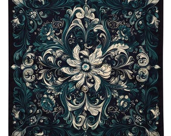 May include: A square, teal and white patterned fabric with a floral design. The fabric has a dark background with intricate details.