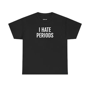 May include: Black t-shirt with white text that reads "I HATE PERIODS" and a small "NOPLAY" logo in the top centre.