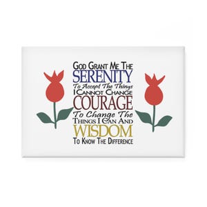 May include: A rectangular white sign with the text "GOD GRANT ME THE SERENITY..." in various colors. Two red tulip illustrations flank the text. The sign is a motivational or inspirational item.