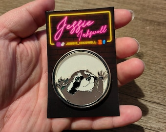Spinning Raccoon Hard Enamel Pin- Pedro