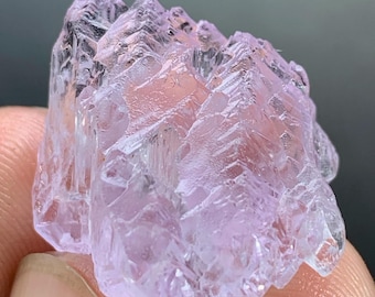Raw Kunzite Crystal: 45 Carat Fluorescent Gemstone from Afghanistan