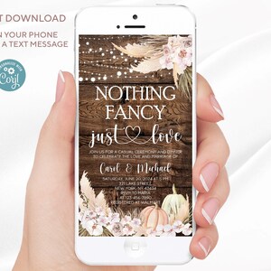 May include: A mobile phone screen shows a wedding invitation with the words "NOTHING FANCY just love." The design includes a wooden background, floral decorations, and the names Carol & Michael. The phone is held in a hand.