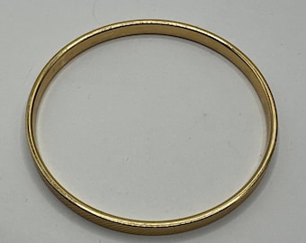 Vintage small Monet gold tone textured bangle bracelet 2.5” Across