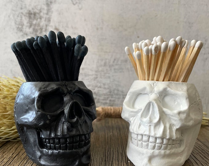 Skull match holder with matches