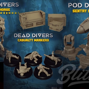 May include: A collection of tan miniature figures and terrain pieces including a horse with a cape labelled HORSE DIVERS SUPPORT HORSE, rectangular crates, five fallen figures labelled DEAD DIVERS CASUALTY MARKERS, and three sentry turrets labelled POD DIVERS SENTRY SUPPORT.