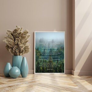 May include: A framed print with the text "Full Moon" and lyrics by The Black Ghosts, set against a backdrop of a misty forest. The print is in a white frame and is displayed on a wooden floor.