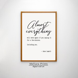 May include: A printable quote by Anne Lamott that reads "Almost everything will work again if you unplug it for a few minutes. Including you." The quote is printed in black text on a white background and framed in a light brown frame. The text "Meliara Prints digital wall art" is printed below the frame.