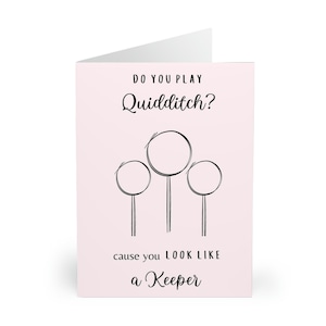 May include: A pink card with the text "Do you play Quidditch?" and a drawing of three Quidditch hoops. The text "cause you look like a keeper" is below the hoops.