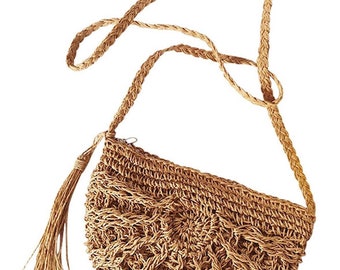May include: A brown woven straw handbag with a long strap and a tassel. The bag is half-circle shaped and has a woven pattern.