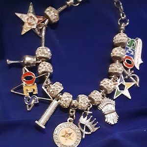 OES CHARMS BRACELET