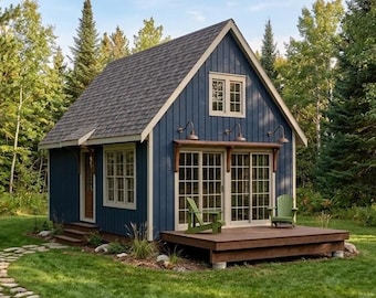 May include: A charming blue cabin with a gray shingled roof, nestled in a lush green landscape. The cabin features a small deck with two green chairs, large windows, and a stone pathway leading to the entrance. The surrounding area is filled with trees.