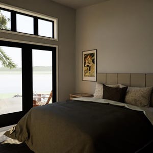 May include: Bedroom interior with a bed, nightstands, and framed artwork. The bed has a dark gray comforter and decorative pillows. A large window and door offer a view of the outdoors. A vintage "YOUTUBE" poster is on the wall.
