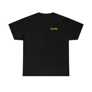 May include: Black short-sleeved t-shirt with the text "Stance Bodega" in gold lettering.