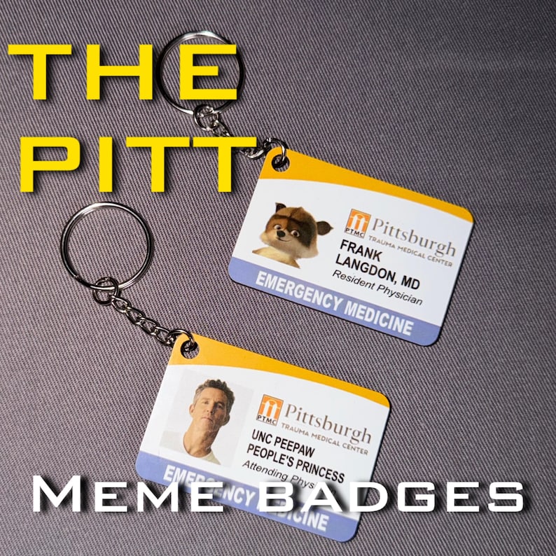 May include: Two keychains with ID badge designs. One features a raccoon image and the name Frank Langdon, MD, with "Emergency Medicine" text. The other shows a man's photo and the name UNC Peepaw. The text "The Pitt" and "Meme Badges" are also visible.
