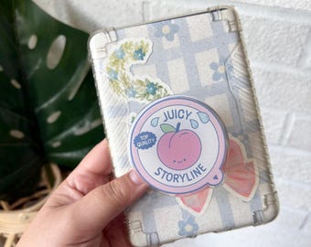 Juicy storyline bookish peach glitter magnet kindle grip
