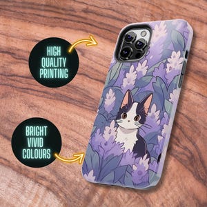 May include: A clear phone case with a black and white cat illustration surrounded by purple flowers. The case has a raised camera bump and a black border. The text "HIGH QUALITY PRINTING" and "BRIGHT VIVID COLOURS" are visible in the image.