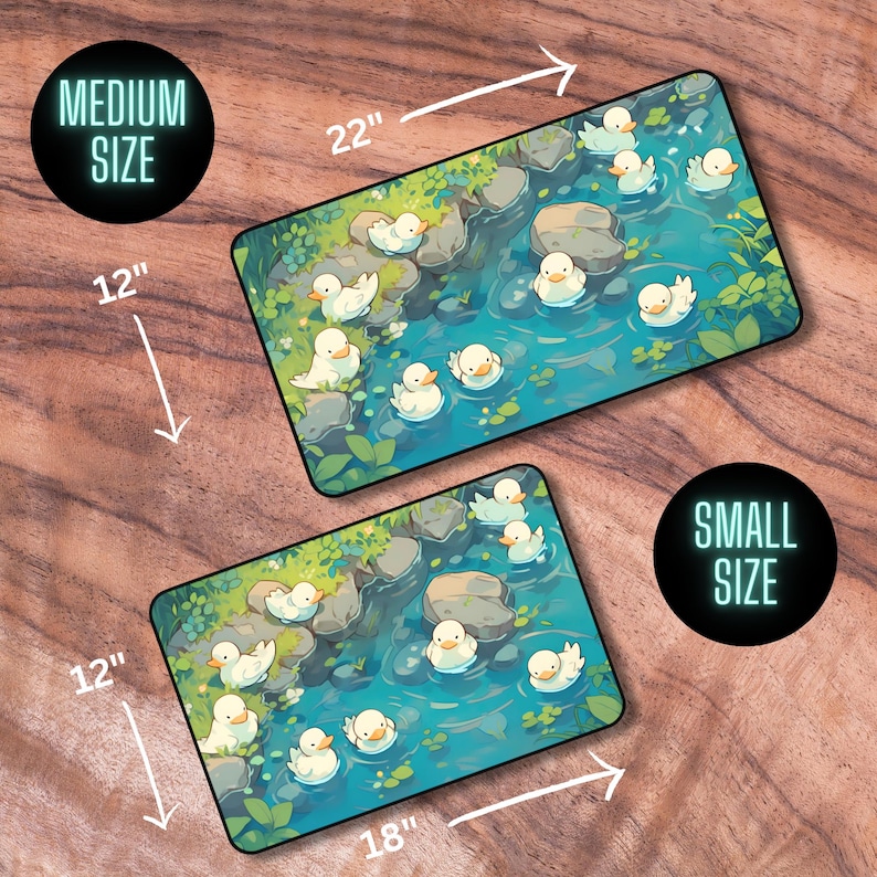 May include: Two different sizes of mousepads featuring a whimsical design of white rubber ducks swimming in a blue stream with green foliage and rocks. The smaller mousepad is 18 inches by 12 inches and the larger mousepad is 22 inches by 12 inches.