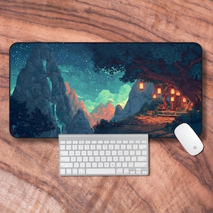 May include: A rectangular mouse mat with a pixelated landscape of mountains, waterfalls, and a starry sky. A white keyboard and mouse are positioned below the mat on a wooden surface.