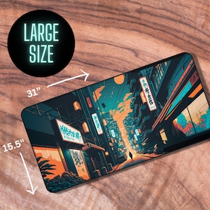 May include: A large size mousepad featuring a colorful illustration of a city street at night with Japanese text. The street is lined with buildings and streetlights. The mousepad measures 31 inches by 15.5 inches.