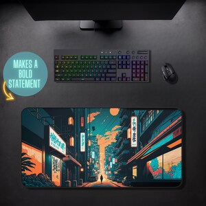 May include: A black and blue mousepad with a colorful illustration of a Japanese city street at night. The street is lined with buildings and shops with glowing neon signs. The text on the signs reads "待ち合わせ" and "博多ラーメン".