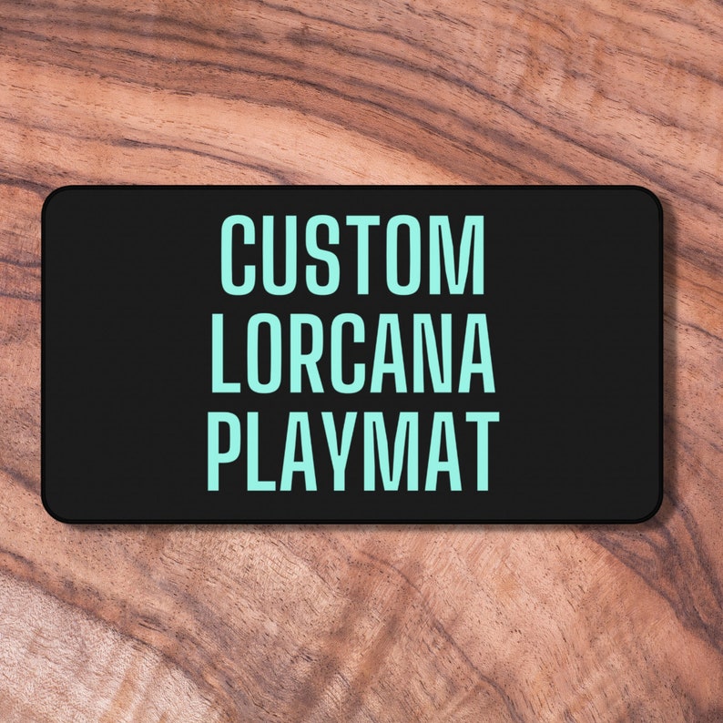 May include: Black rectangular playmat with the text "CUSTOM LORCANA PLAYMAT" in light blue.