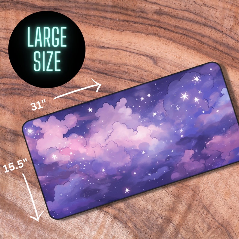 May include: A large purple and pink galaxy-themed mouse mat with white stars. The mouse mat measures 78.7 cm by 39.4 cm.