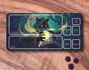 May include: A black cat wearing a hooded robe holds a glowing orb in its paws. The image is a game mat with sections labeled "Battlefield", "Lands", "Command Zone", "Exile", "Library", "Graveyard", and "Life".