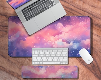 May include: A pink and purple galaxy-themed desk mat with a matching wrist rest and keyboard. The desk mat features a starry night sky with fluffy clouds.