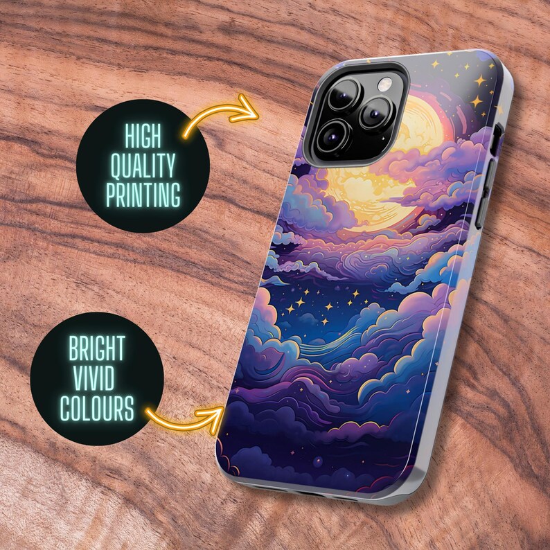 May include: A phone case featuring a colourful illustration of a moon and clouds. The case is white with a clear back and has a high-quality print. The illustration features bright, vivid colours.