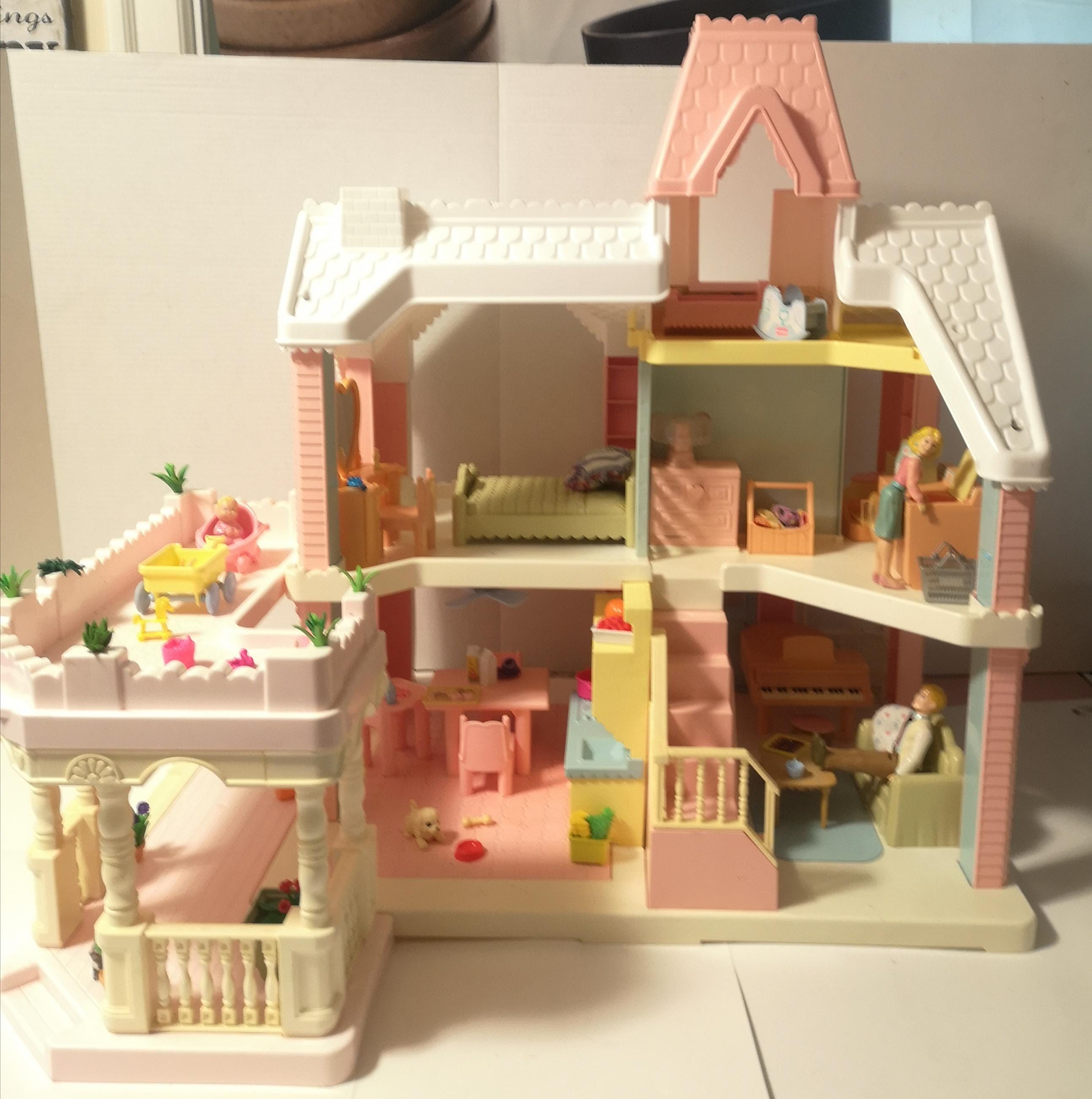 Vintage 1991 Victorian Playskool Dollhouse With Many Pieces Of Furniture Accessories Mom Dad And Baby With RARE Wrap Around Deck